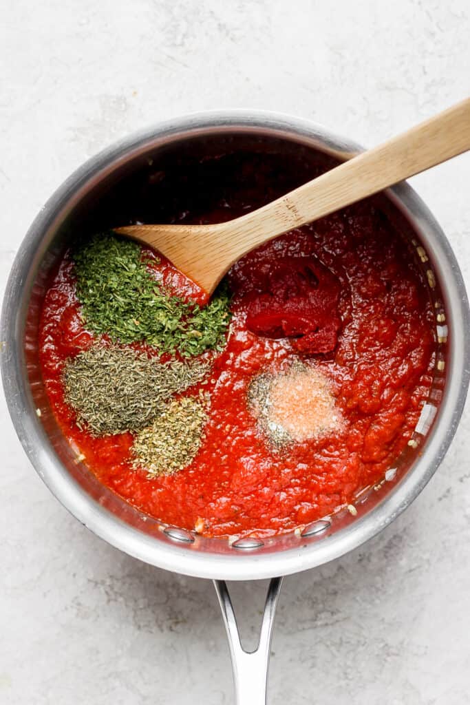 tomato sauce and spices in pot