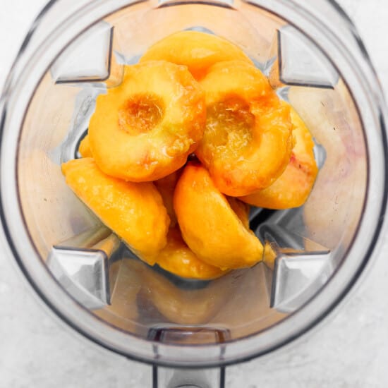 Blend sliced peaches in a food processor to create peach muffins.