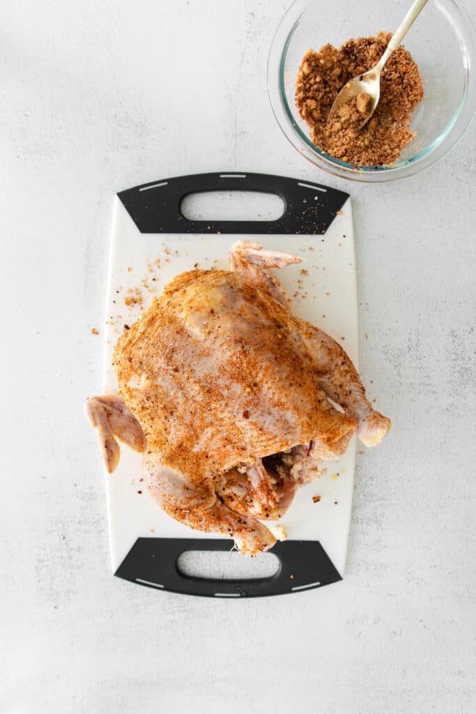 raw chicken on cutting board.