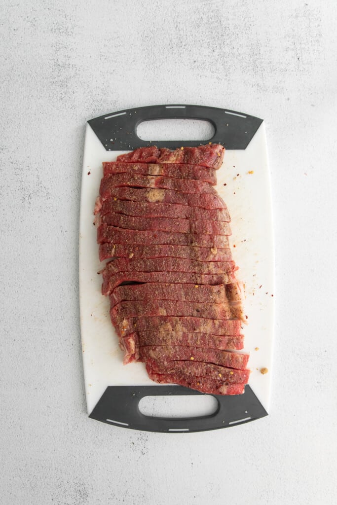 Pepper steak sliced into thin strips.