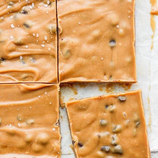 squares of peanut butter fudge on a baking sheet.
