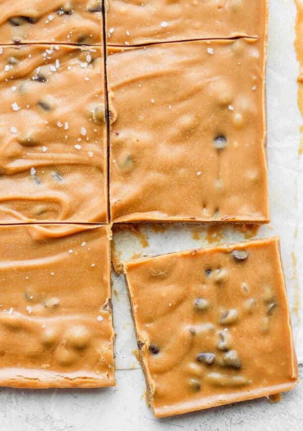 squares of peanut butter fudge on a baking sheet.