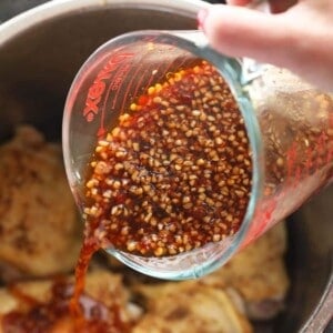pouring in honey garlic sauce.