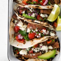 Mexican steak tacos seasoned and baked in a dish.