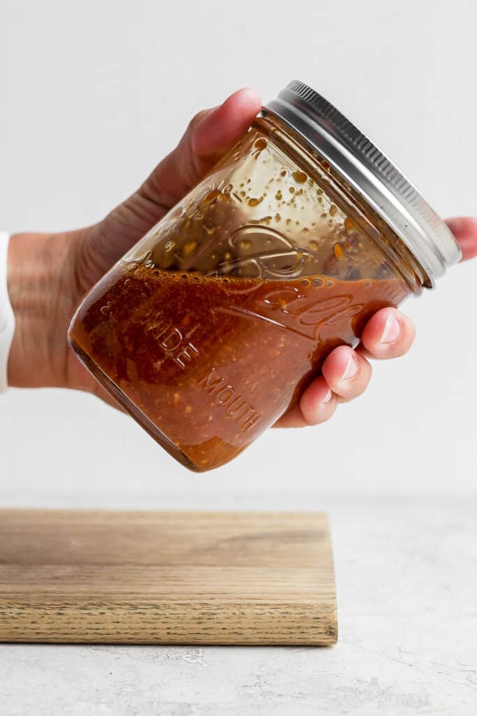 Stir the sauce in a mason jar with someone's hand shaken 