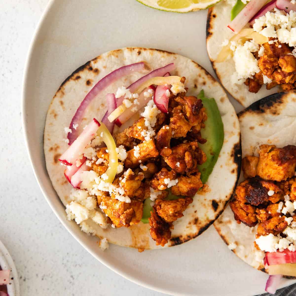 The BEST Tofu Tacos Recipe (w/ Slaw!) via Fit Foodie Finds