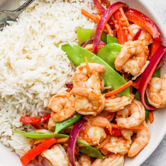 shrimp stir fry with rice in bowl