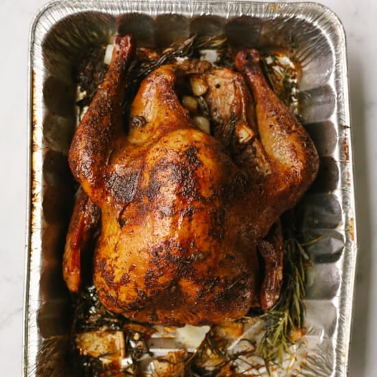 smoked turkey in tin foil pan.
