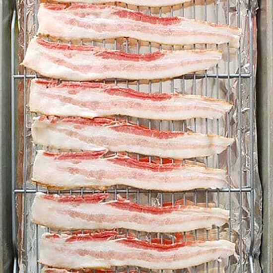 bacon on metal rack.