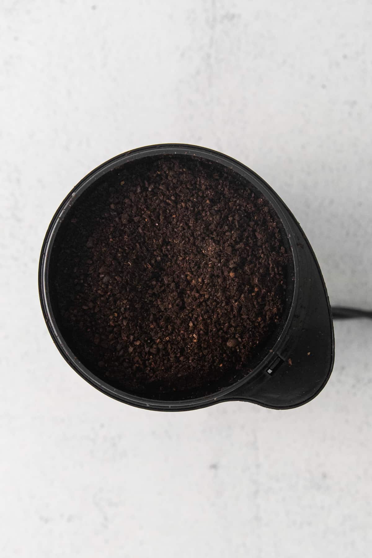 coffee grounds in coffee grinder