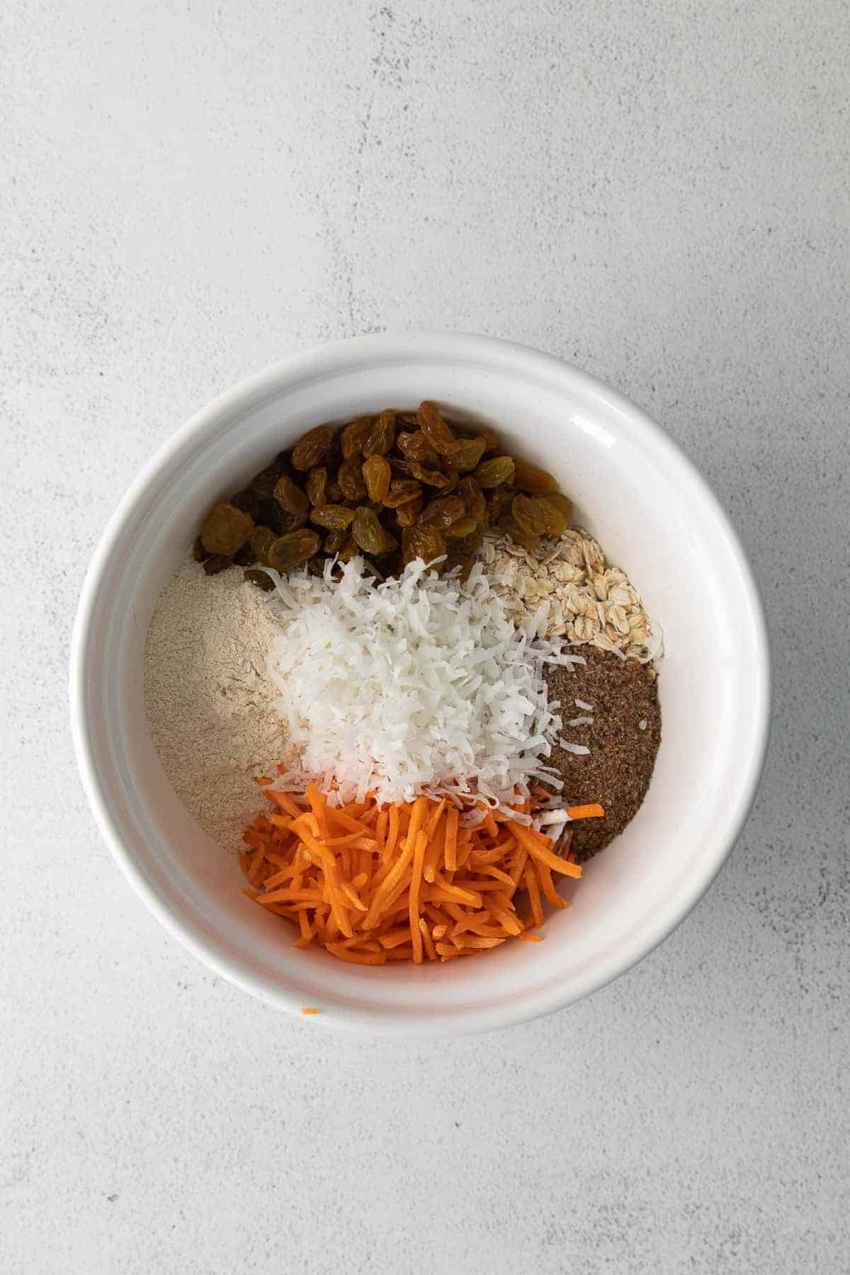 dry ingredients for morning glory baked oatmeal in a bowl