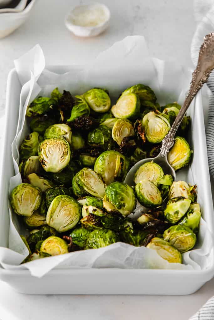 Air fryer brussel sprouts in a casserole dish. 