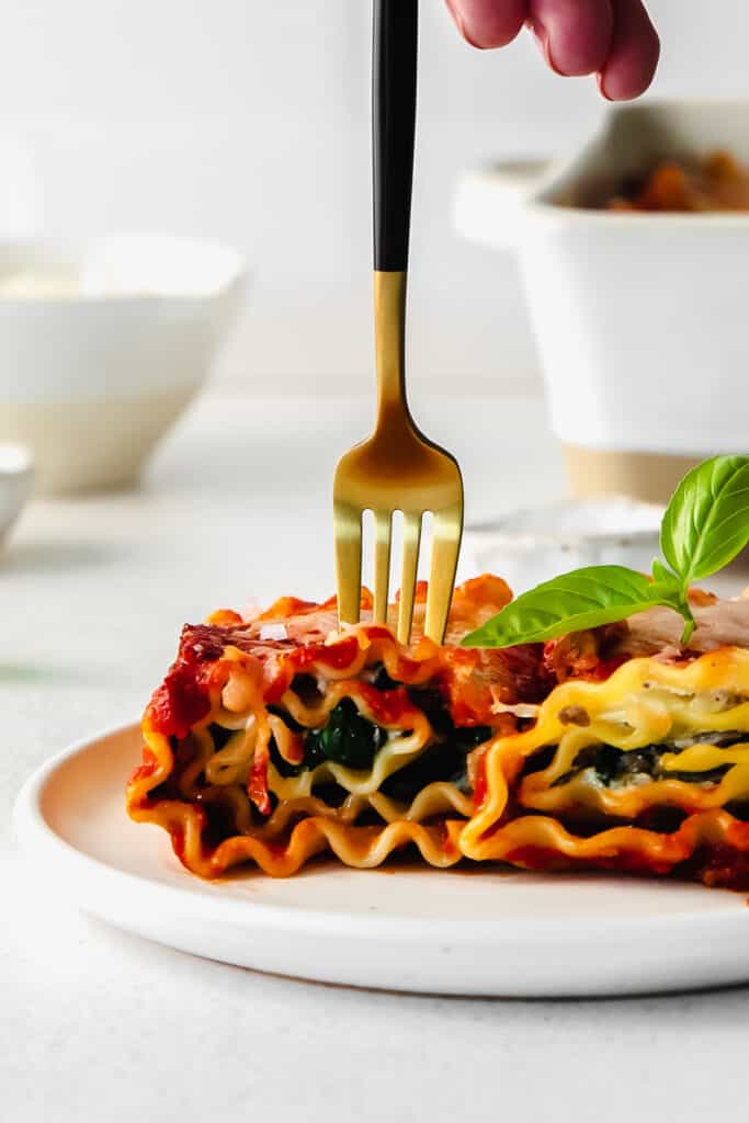 Lasagna roll ups on a plate. 