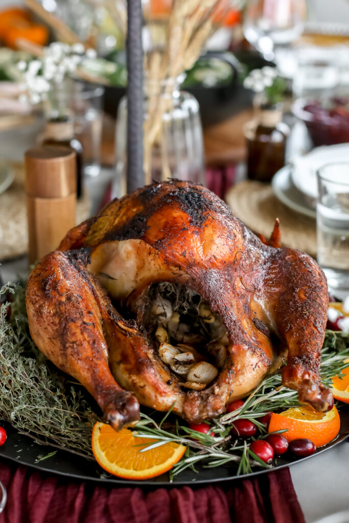 whole smoked turkey on a thanksgiving table