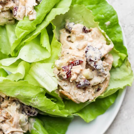 Cranberry chicken lettuce wraps on a plate.