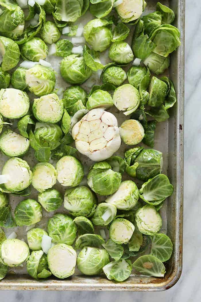 raw Brussels sprouts on sheet pan