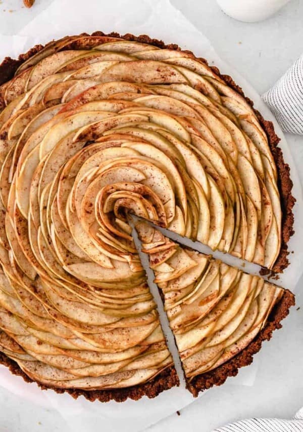 Apple Tart with a slice being removed