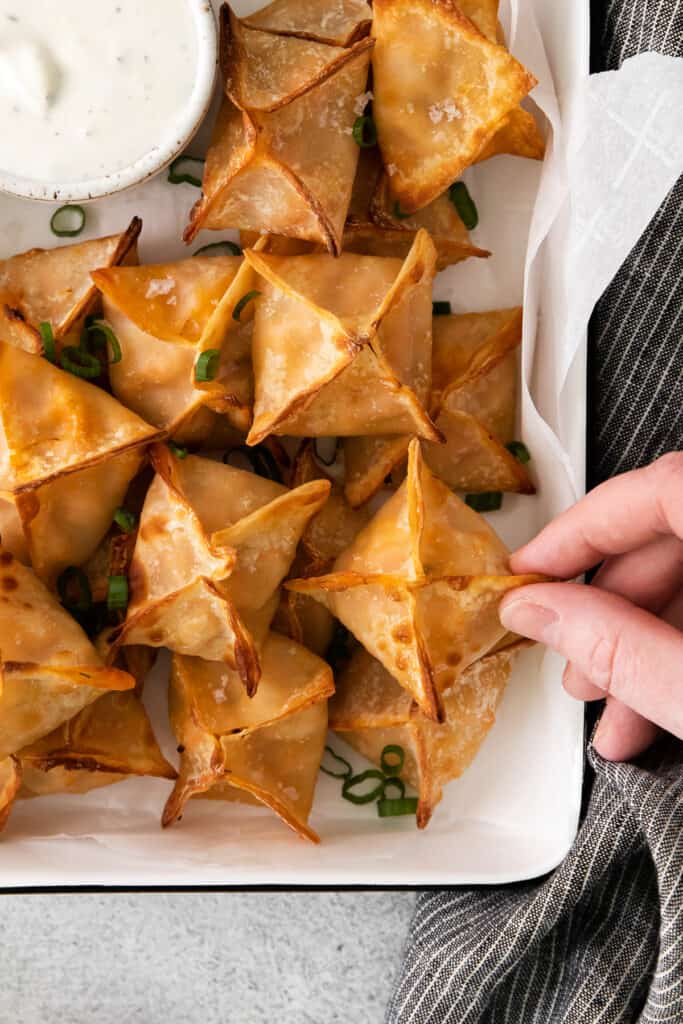 buffalo chicken wontons in container