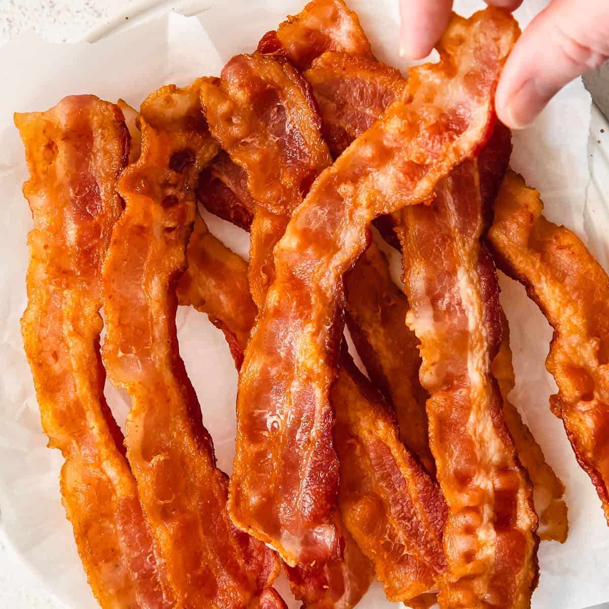 https://fitfoodiefinds.com/wp-content/uploads/2021/12/Bacon-on-the-stove-04-1.jpg