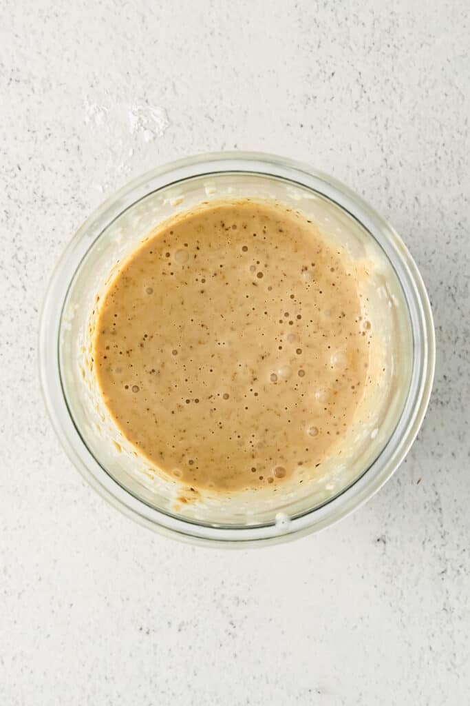 blended baked oatmeal ingredients blended together in a glass.