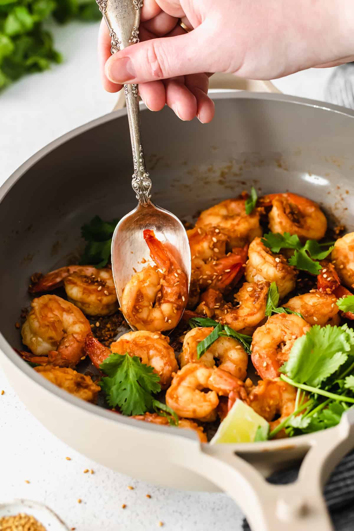 Sautéd shrimp with sesame seeds and fresh herbs. 