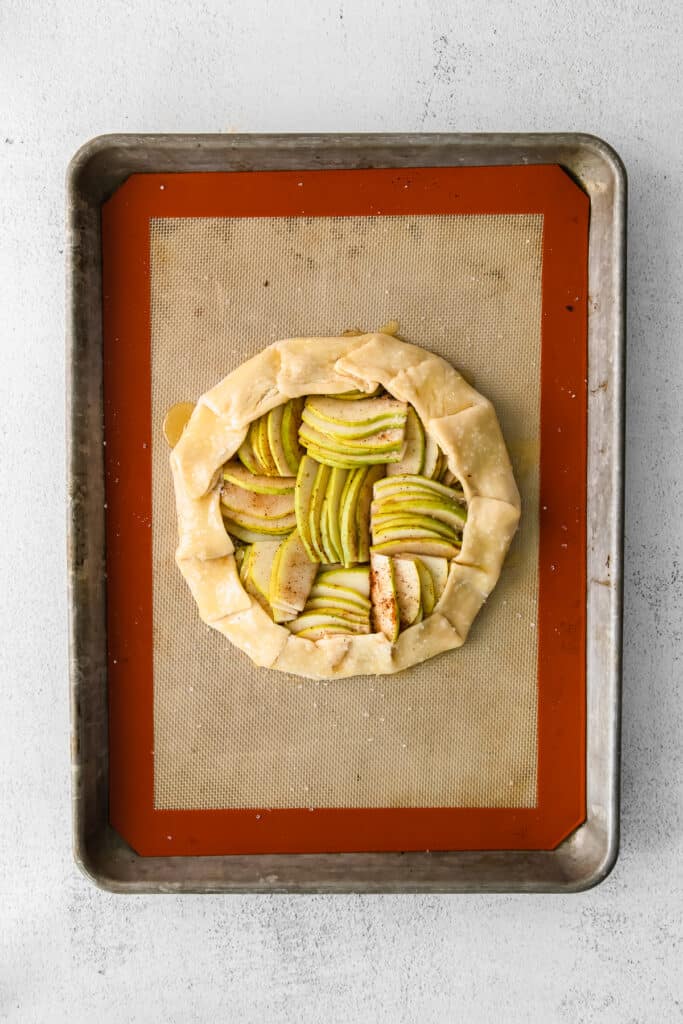Pears in the middle of a pie crust. 