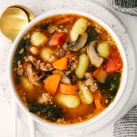 sausage gnocchi soup in a bowl