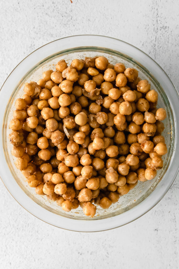 Chickpeas marinating in a bowl. 