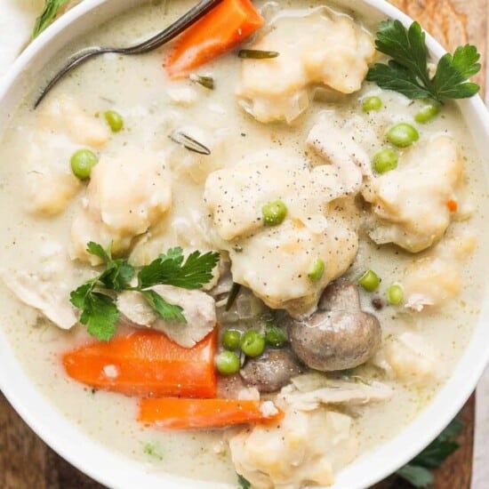 Get the best of both worlds with slow cooker chicken and dumplings! This recipe makes tender, moist chicken and small dumplings that are perfect. This is a great weeknight comfort meal!