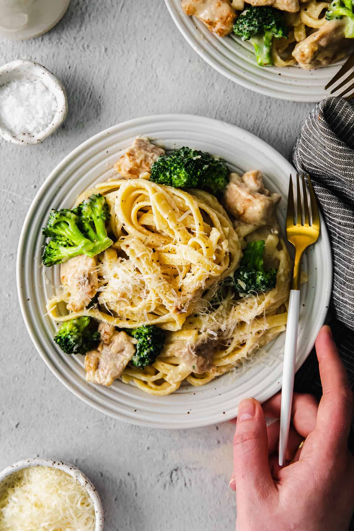 Chicken broccoli alfredo on a plate. 