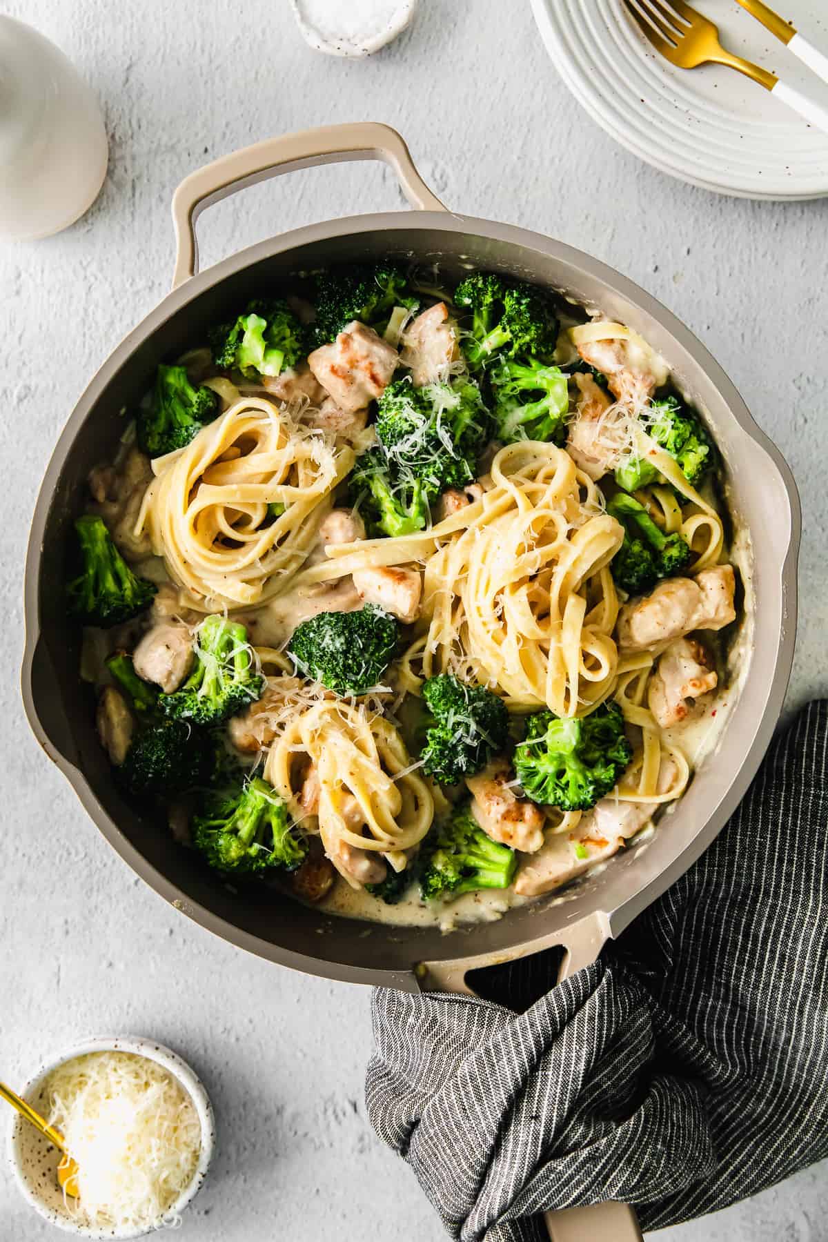 Chicken broccoli alfredo in a pan. 