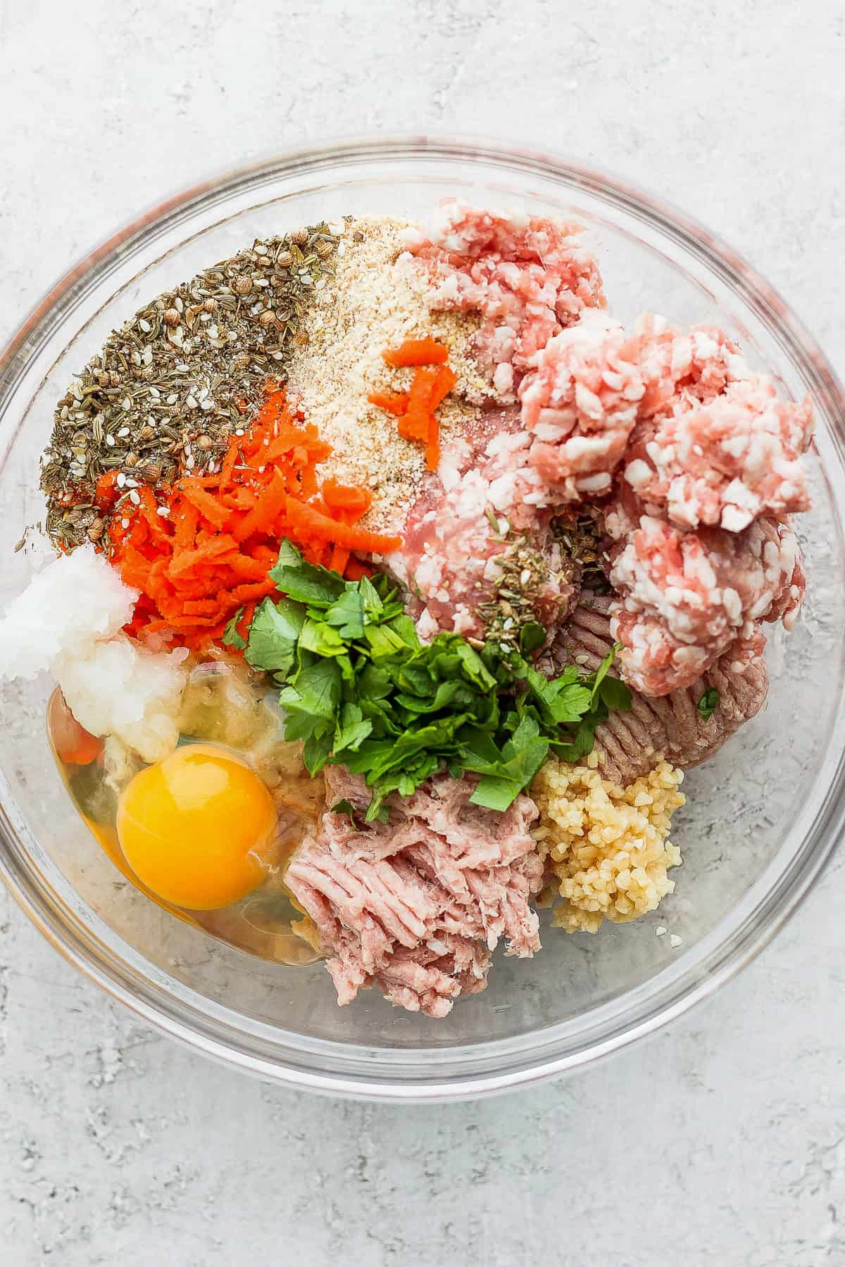 Ingredients for One-Pot Za'atar Meatballs and Quinoa in a bowl. 