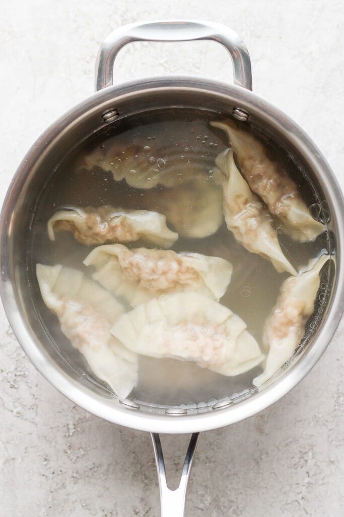 pork dumplings in boiling water