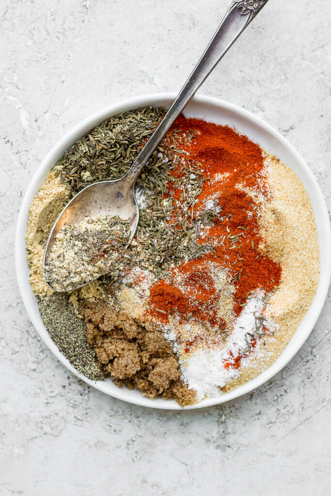 homemade salmon seasoning on a plate with a spoon