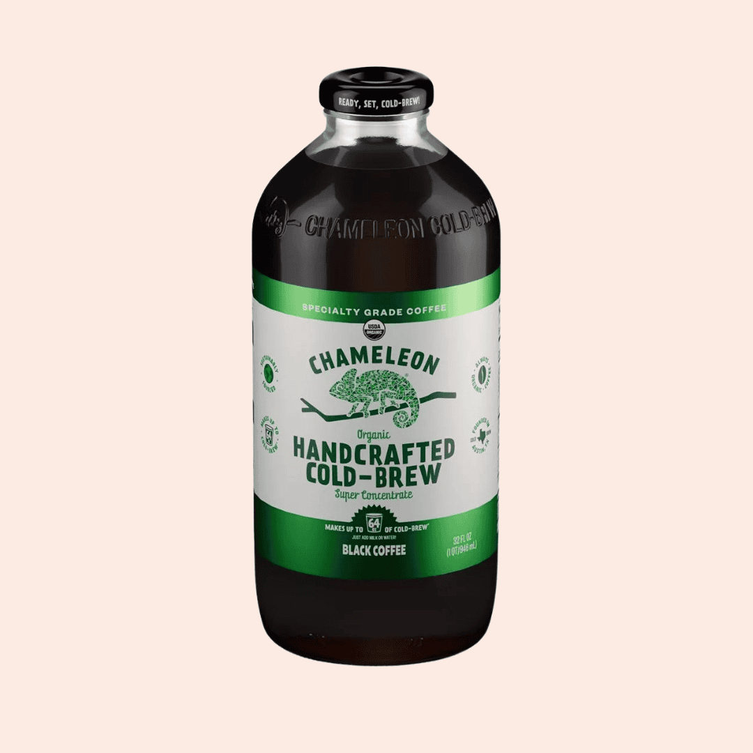 A bottle of Chameleon Organic Handcrafted Cold-Brew Black Coffee with a green label, containing 32 fl oz of coffee.