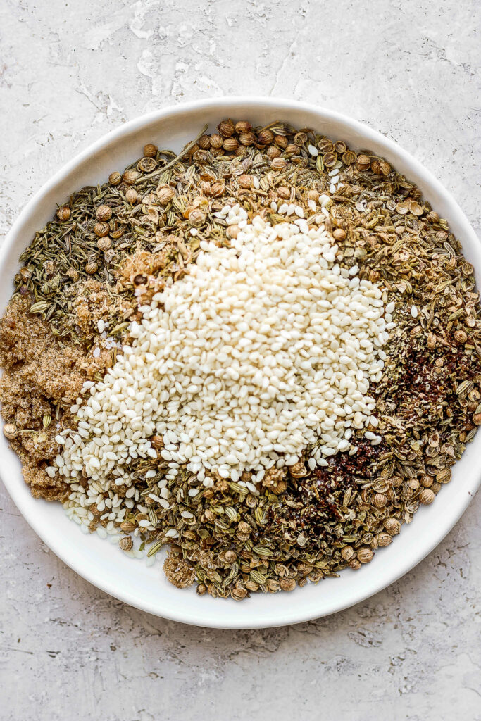 ingredients for za'atar seasoning on a plate