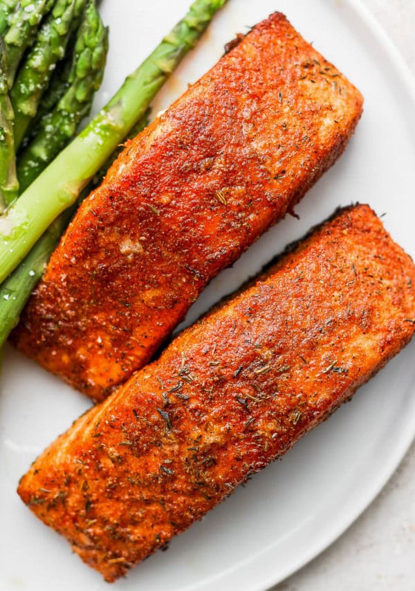 air fryer salmon on a plate with asparagus