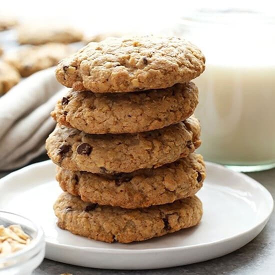 A stack of healthy oatmeal cookies on a plate.