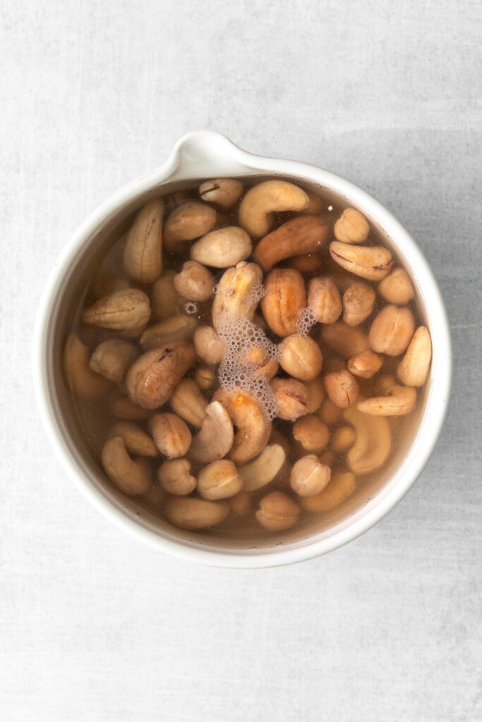 raw cashews soaking in water