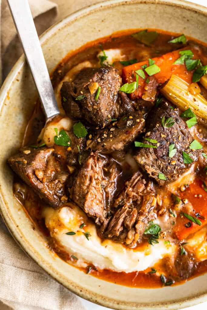 Beef stew over mashed potatoes. 