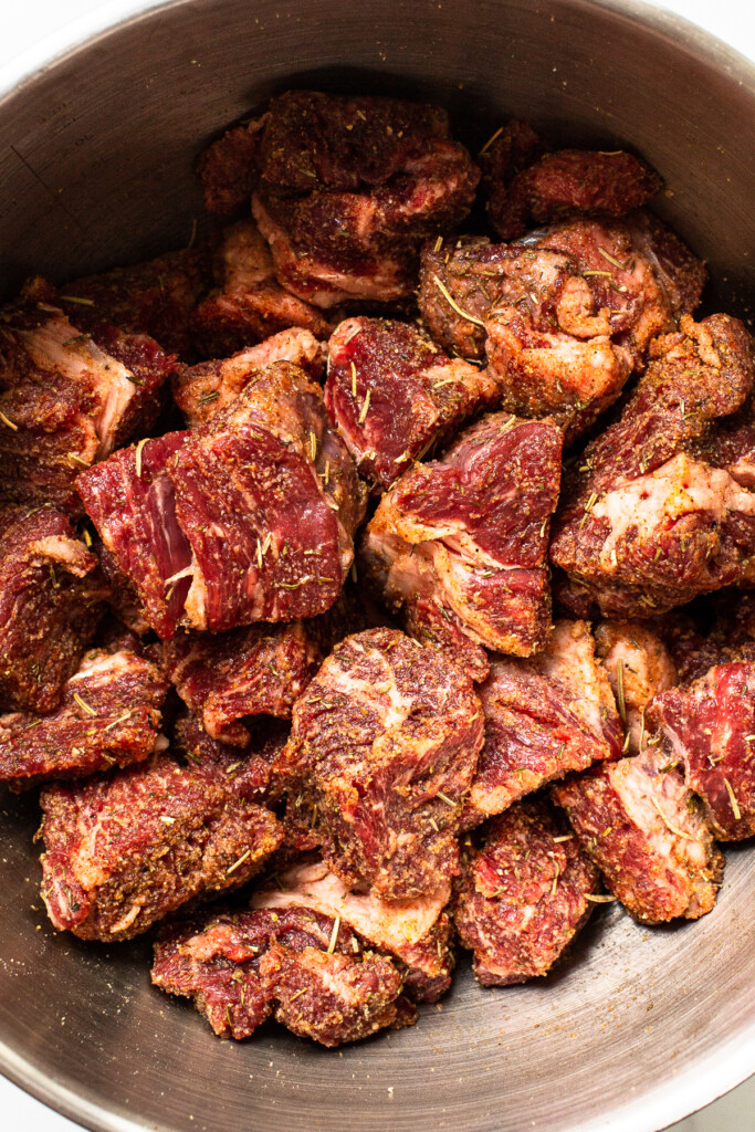 Beef chunks in a pot. 