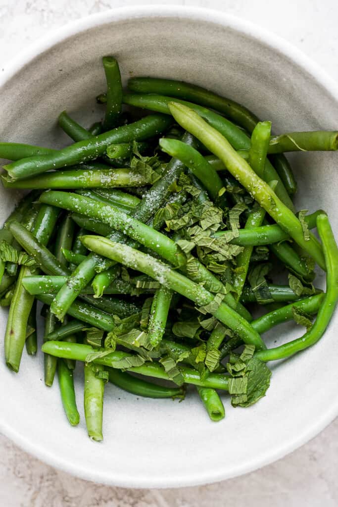 Blanced green beans with fresh mint. 