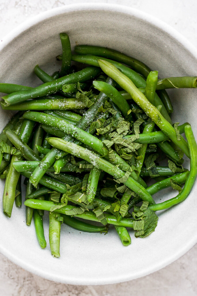 Blanced green beans with fresh mint. 