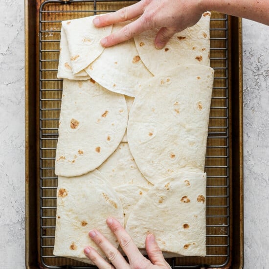 Carefully fold the filling into the tortillas.