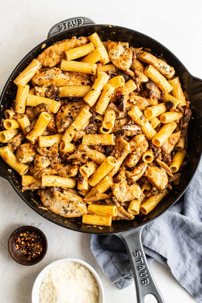 chicken mushroom pasta in a pan. 
