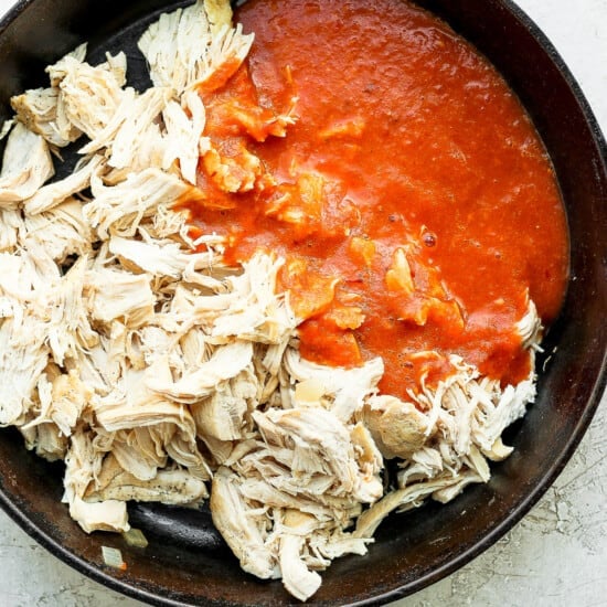 chicken and sauce in pot.
