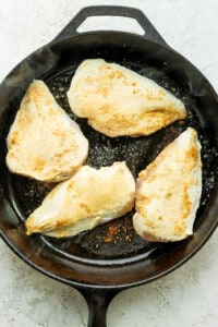 pan frying chicken.