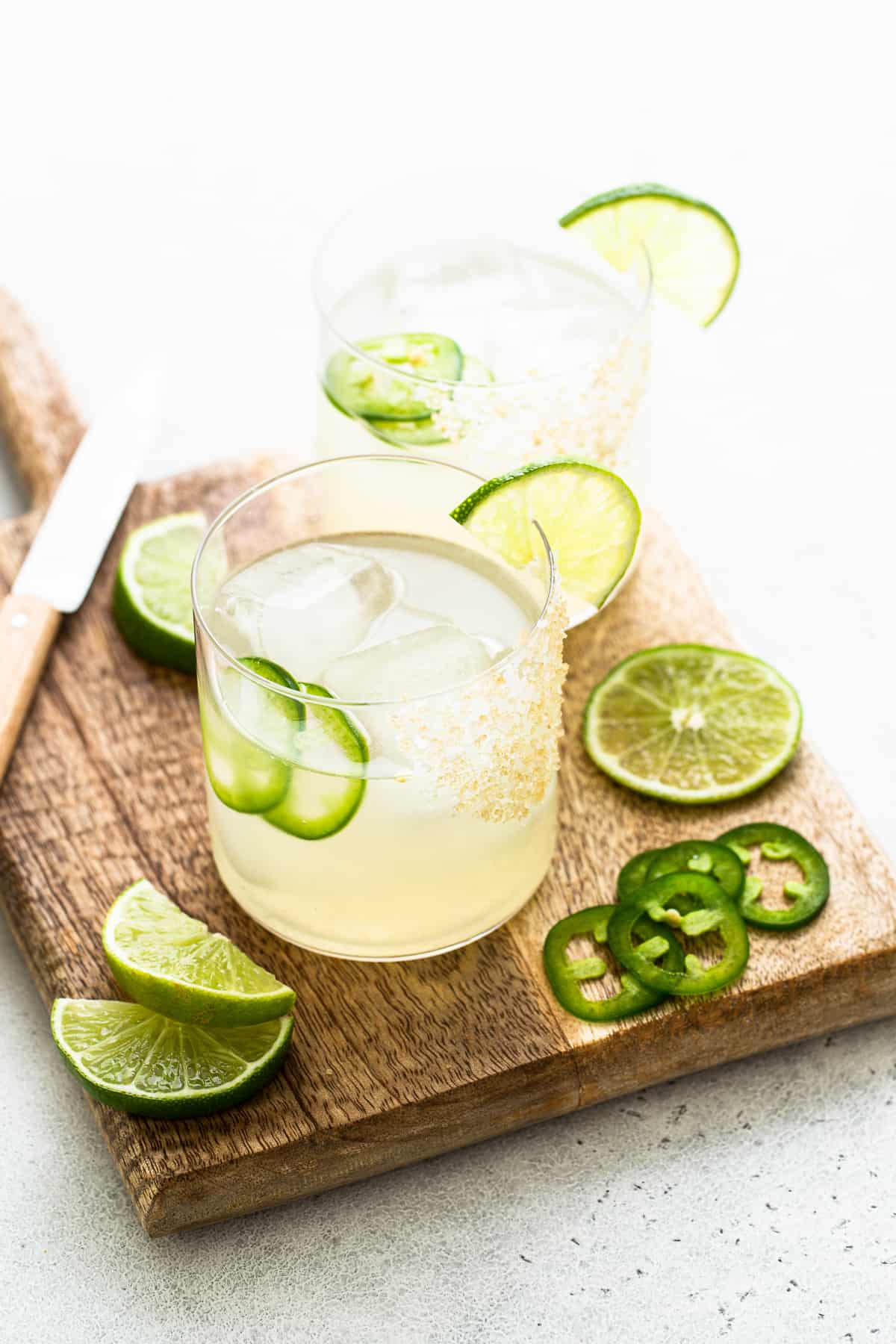 Spicy mezcal margaritas in a glass.
