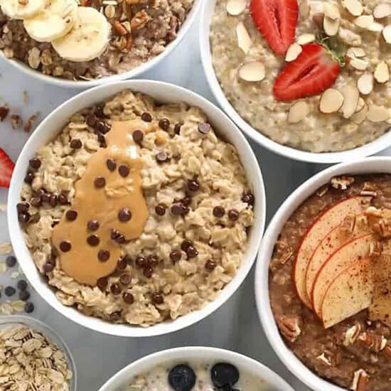 Five bowls of oatmeal with different toppings