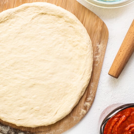 rolled out pizza dough.